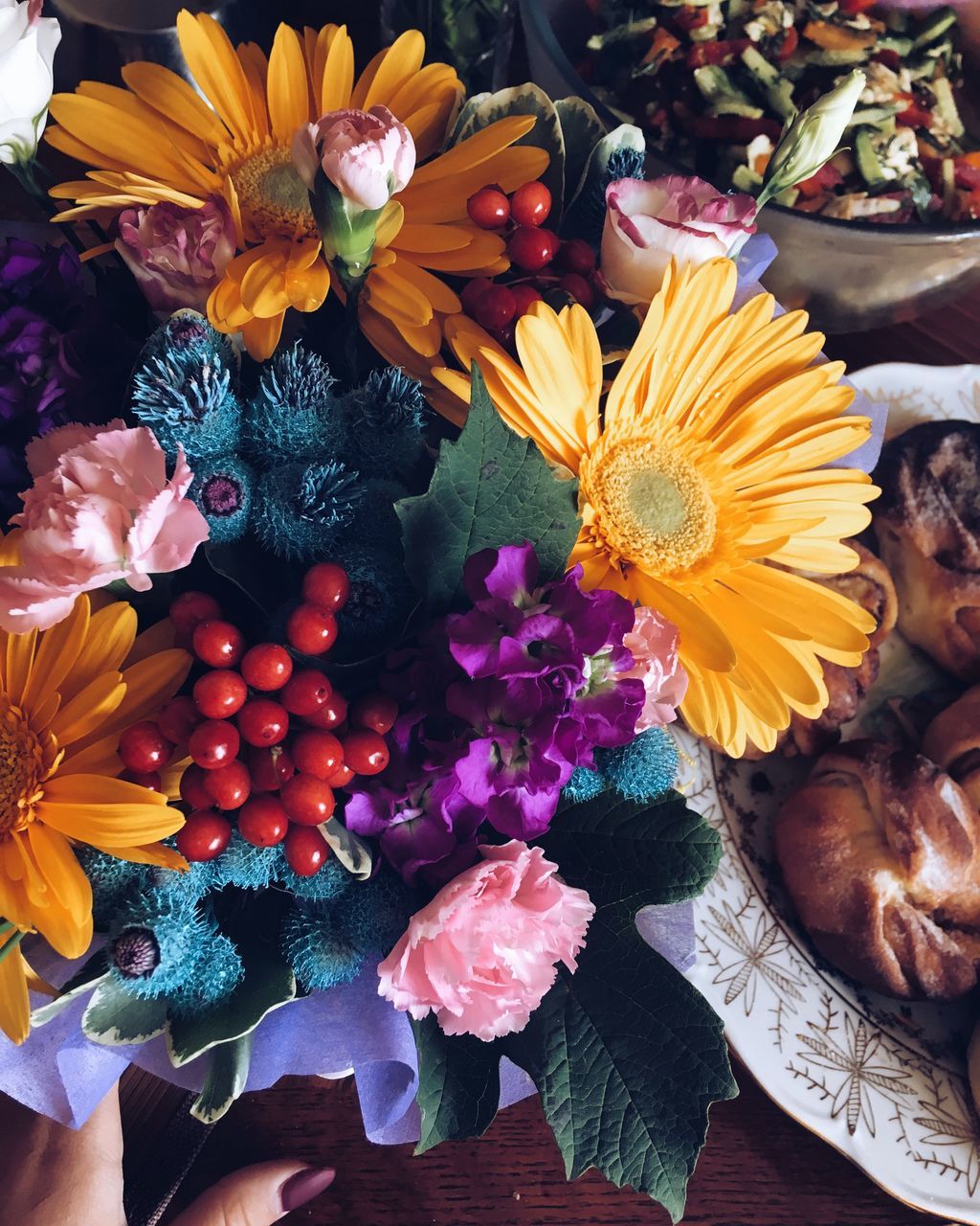 HIGH ANGLE VIEW OF MULTI COLORED FLOWERS ON PLANT