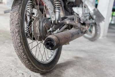 Close-up of bicycle on street