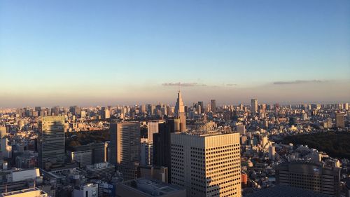 View of cityscape against clear sky