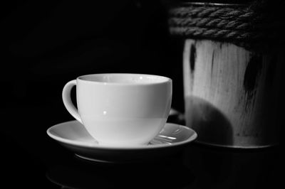 Close-up of coffee cup on table