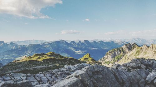 Panoramic view of mountain ranges against sky