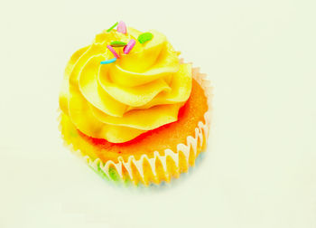 Close-up of cupcakes against white background