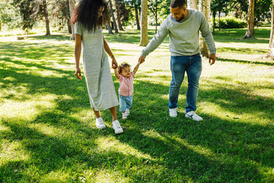 Full length of women standing on grass