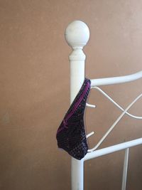 Ladies panties hanging on bed pole