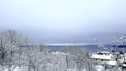 Scenic view of frozen lake against sky