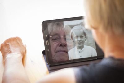 Portrait of woman using smart phone