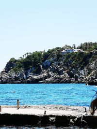 Scenic view of sea against clear sky