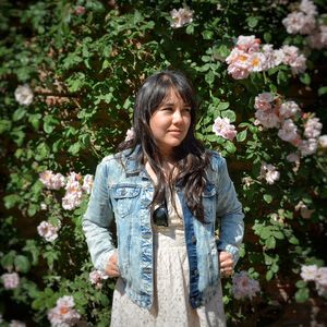 Portrait of young woman in a garden