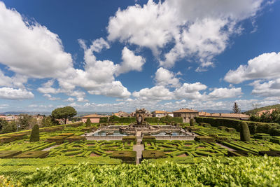 Scenic view of landscape against cloudy sky