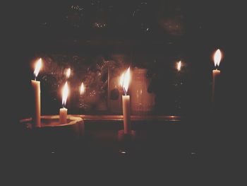 Close-up of illuminated candles