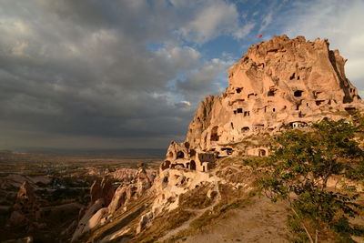 Uchisar castle at sunset. cappadocia. turkey