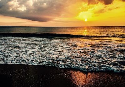 View of calm sea at sunset