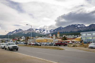 Cars on road against sky