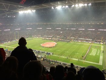 People looking at soccer field