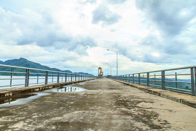 Pier over sea against sky