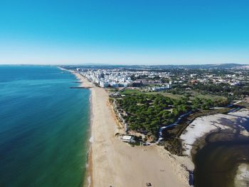 Scenic view of sea against blue sky