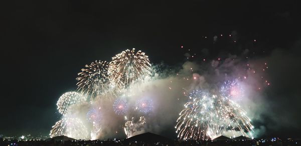 Firework display at night