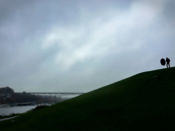 Scenic view of river against sky