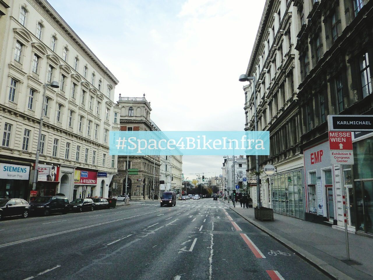 transportation, building exterior, architecture, street, road, car, built structure, road marking, the way forward, city, land vehicle, mode of transport, diminishing perspective, sky, incidental people, city street, city life, vanishing point, road sign, text