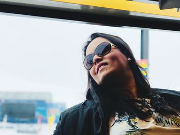 Smiling woman looking away