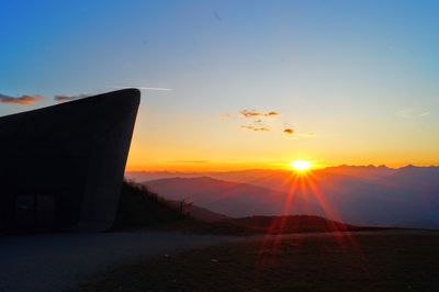 Scenic view of silhouette landscape against sky during sunset