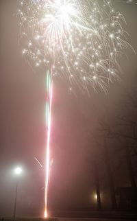 Firework display at night