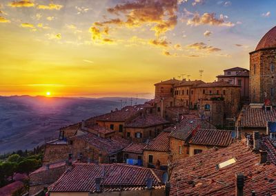 High angle view of townscape against sky during sunset