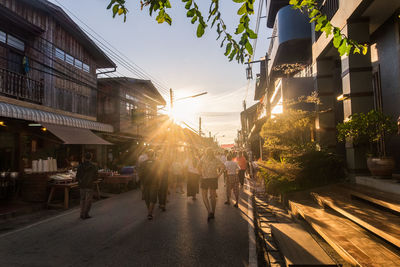 People walking on street in city