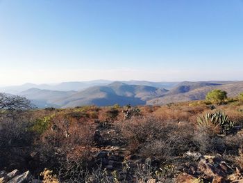 Scenic view of mountains against clear sky