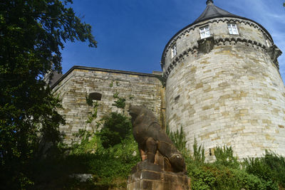 Low angle view of historical building against sky