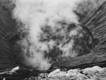 Smoke emitting from volcanic mountain