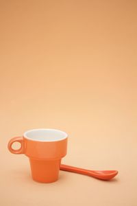 Close-up of coffee cup on table