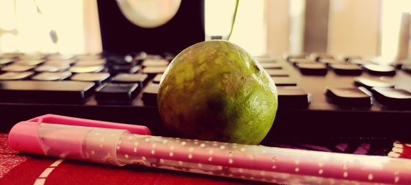 Close-up of apple on table