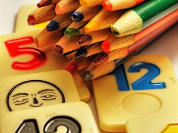 Close-up of colorful pencils on table