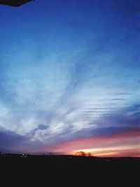 Scenic view of silhouette landscape against sky during sunset
