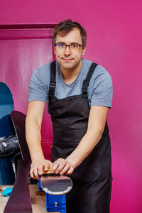 Portrait of senior man preparing food at home