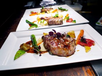 Close-up of food served on table