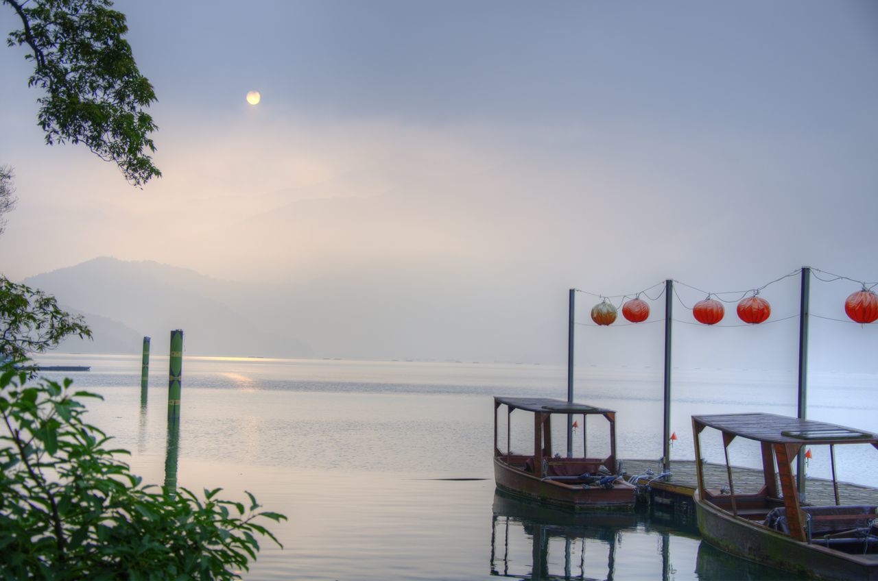 water, sky, beauty in nature, nature, scenics - nature, tranquility, sea, tranquil scene, no people, nautical vessel, mountain, sunset, outdoors, transportation, plant, non-urban scene, day, pier