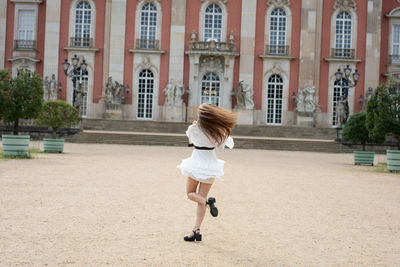 Full length of woman running