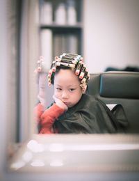 Close-up of a funny girl at hairdresser
