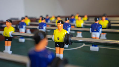 Close-up of yellow figurine