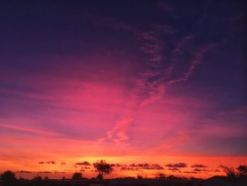 Low angle view of dramatic sky during sunset