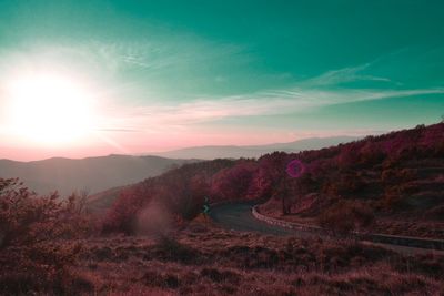 Scenic view of landscape against sky during sunset