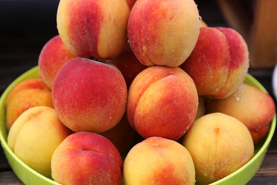 Peaches close up on the local farm market, eco juicy fruits. shopping organic products. 