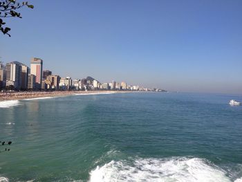 Scenic view of sea against blue sky