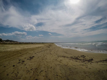 Scenic view of beach against sky