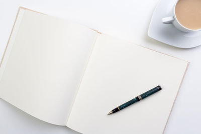 High angle view of coffee cup on table