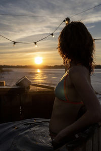 Rear view of young woman in bikini