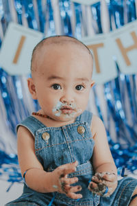 Portrait of cute baby at home