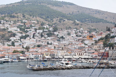 High angle view of townscape by sea